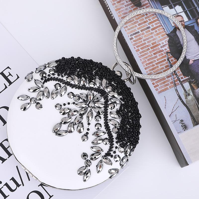 Европейский и американский круглый бриллиантовый ужин рука женское банкетное платье вечерний круглый стразовый банкетный мешок
Европейский и американский круглый бриллиантовый ужин рука женское банкетное платье вечерний круглый стразовый банкетный мешок