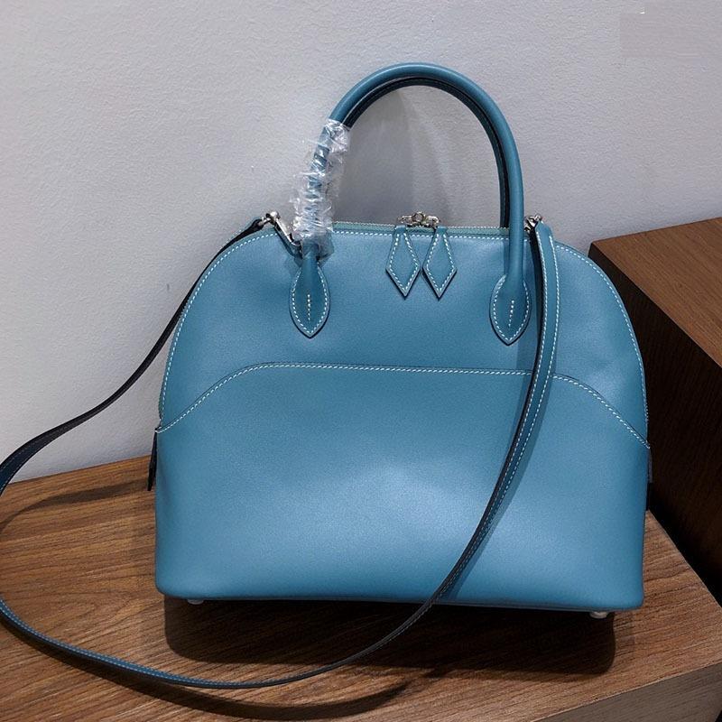 Натуральная кожа Накладка на носок из ракушки Коровья кожа Сумка для боулинга Сумка-тоут Модная Одноплечевая Кроссбоди Высококлассная Универсальная Женская Сумка 32x24x13cm
Натуральная кожа Накладка на носок из ракушки Коровья кожа Сумка для боулинга Сумка-тоут Модная Одноплечевая Кроссбоди Высококлассная Универсальная Женская Сумка 32x24x13cm