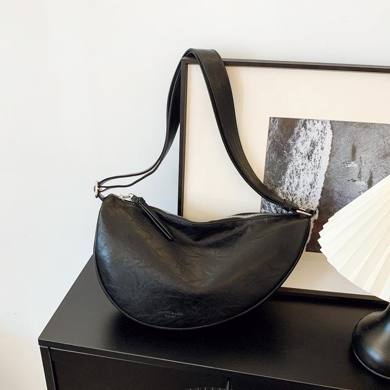 Ретро нишевая сумка женская простая новая универсальная сумка через плечо высококлассная сумка-мессенджер сумка-пельмень чёрный
Ретро нишевая сумка женская простая новая универсальная сумка через плечо высококлассная сумка-мессенджер сумка-пельмень чёрный