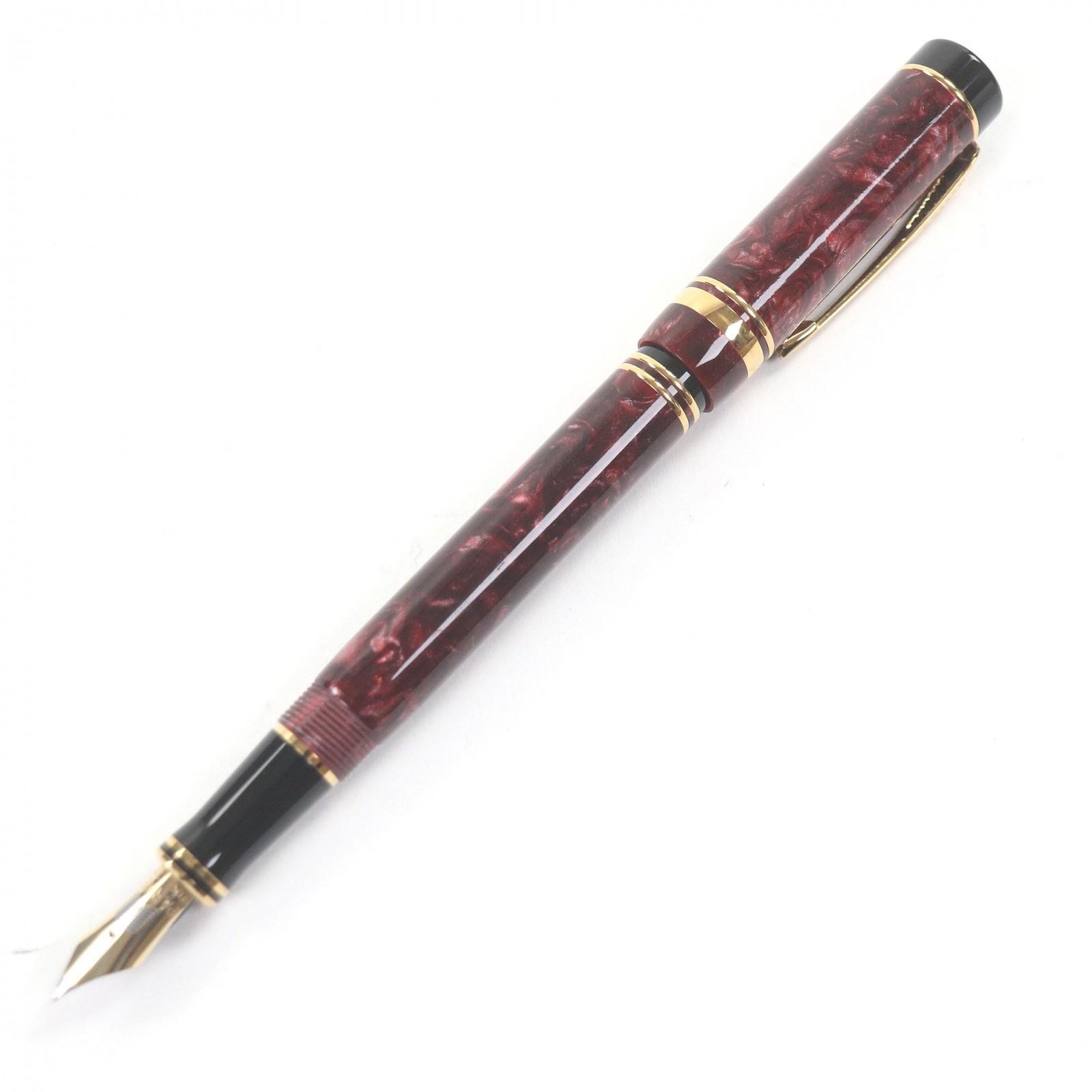 Great PARKER fountain pen Duofold Centennial old model Marble Red 18K mens Used
Great PARKER fountain pen Duofold Centennial old model Marble Red 18K mens Used