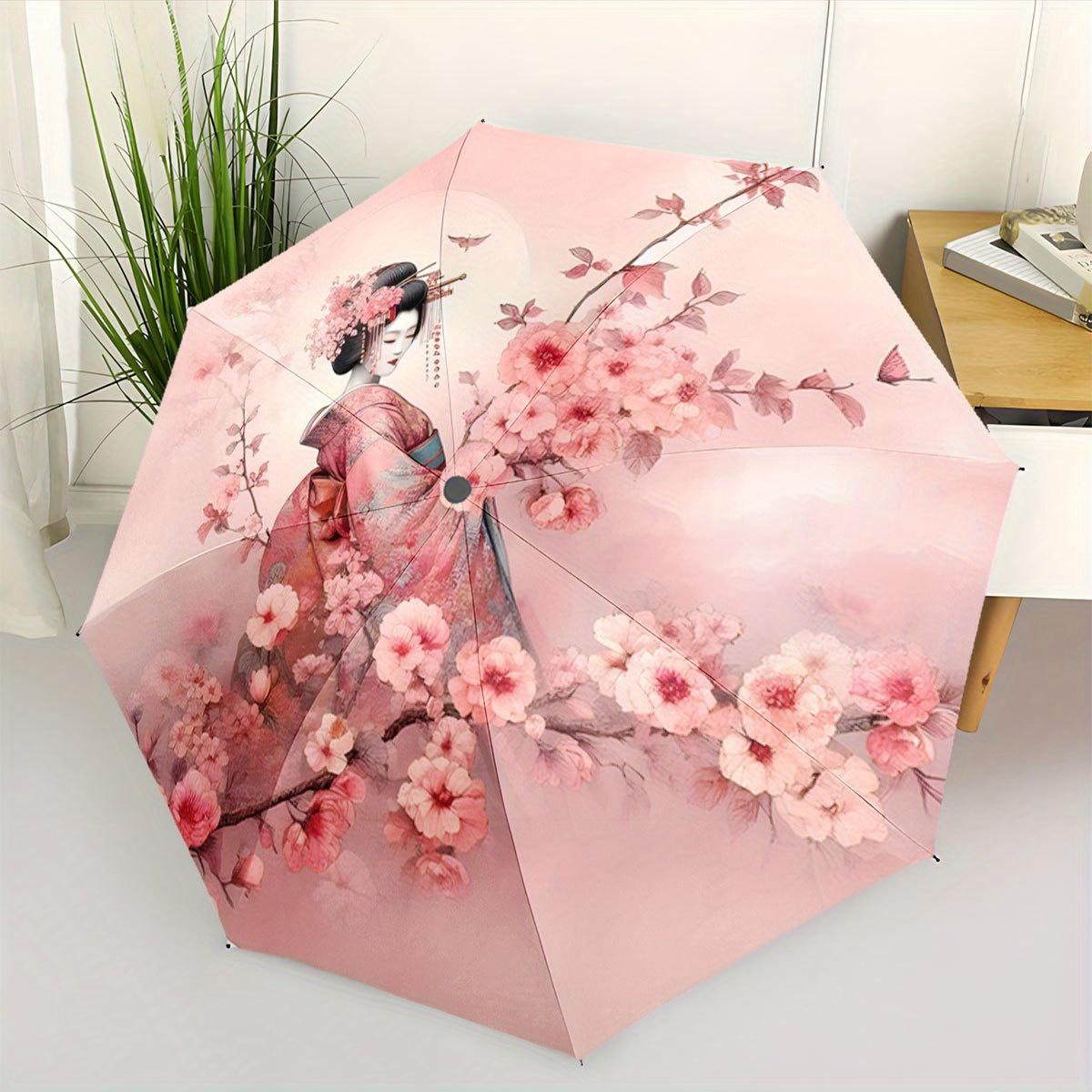 A Figure in a Kimono Amidst Blooming Pink Cherry Trees. This Compact Folding Umbrella Is a Versatile Outdoor Item Suitable for Any Season, M
A Figure in a Kimono Amidst Blooming Pink Cherry Trees. This Compact Folding Umbrella Is a Versatile Outdoor Item Suitable for Any Season, M