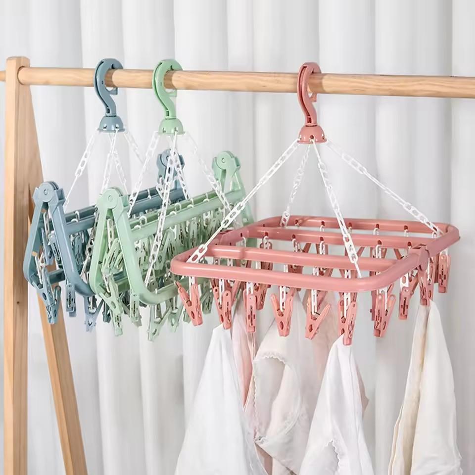 Plastic hanger with 32 clips, designed specifically for hanging clothes, underwear, socks, and daily household items
Plastic hanger with 32 clips, designed specifically for hanging clothes, underwear, socks, and daily household items