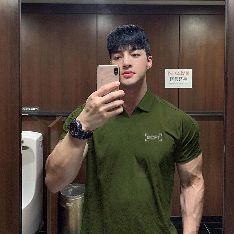 Muscleguys Летняя мужская рубашка поло с лацканами и коротким рукавом Футболка Мужская повседневная деловая рубашка поло Тренд Простой дизайн Повседневные мужские топы
Muscleguys Летняя мужская рубашка поло с лацканами и коротким рукавом Футболка Мужская повседневная деловая рубашка поло Тренд Простой дизайн Повседневные мужские топы