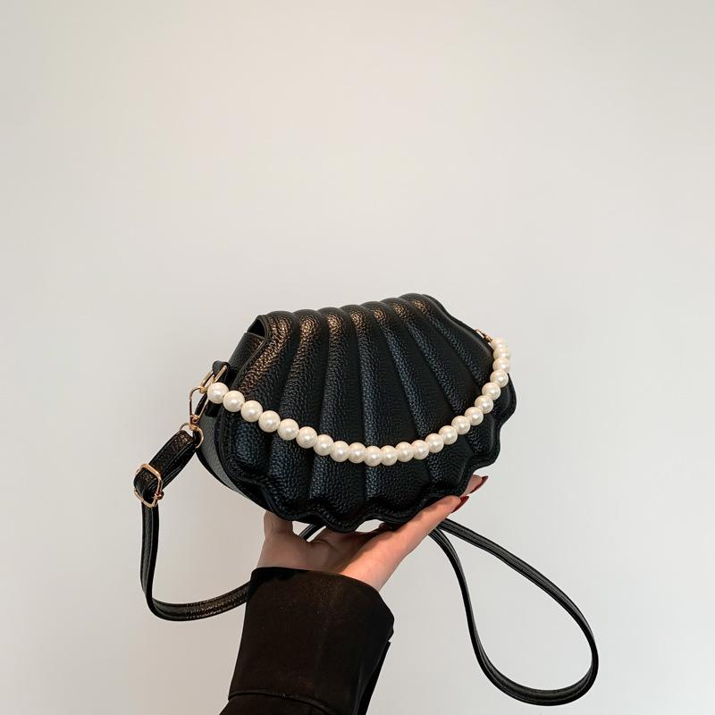 Модная жемчужная сумка-мешок для женщин 2024 года, весна, новая модная сумка через плечо, простая сумка-мессенджер, сумка-ракушка чёрный
Модная жемчужная сумка-мешок для женщин 2024 года, весна, новая модная сумка через плечо, простая сумка-мессенджер, сумка-ракушка чёрный