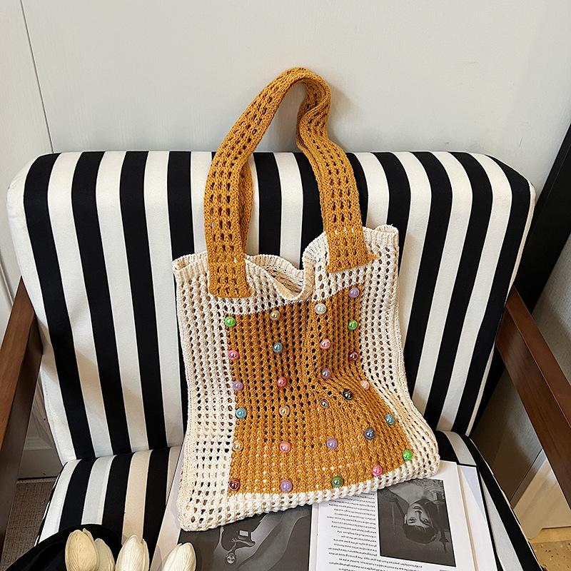 Large capacity hollow knitted bag women s new spring and summer lazy wind shoulder bag seaside vacation water beach
Large capacity hollow knitted bag women s new spring and summer lazy wind shoulder bag seaside vacation water beach