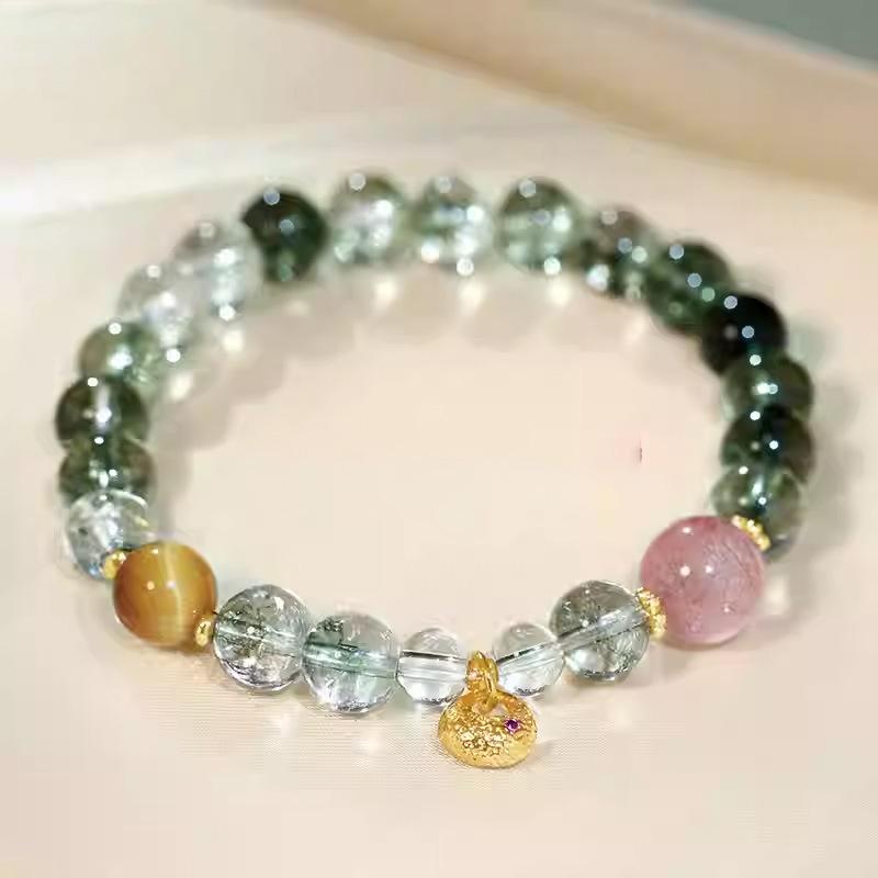 Natural strawberry crystal tiger s eye stone green ghost crystal beaded bracelet light luxury niche temperament versatile high-end jewelry
Natural strawberry crystal tiger s eye stone green ghost crystal beaded bracelet light luxury niche temperament versatile high-end jewelry