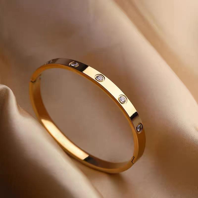 Trendy Gold Kaja Vintage Diamond-Studded Open Bangle – Simple & Stylish Women s Bracelet
Trendy Gold Kaja Vintage Diamond-Studded Open Bangle – Simple & Stylish Women s Bracelet