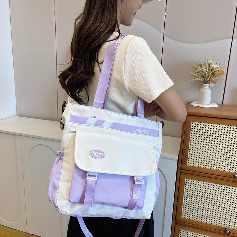 Large capacity trend contrasting color student leisure shoulder bag campus literary and simple handbag рожевий
Large capacity trend contrasting color student leisure shoulder bag campus literary and simple handbag рожевий