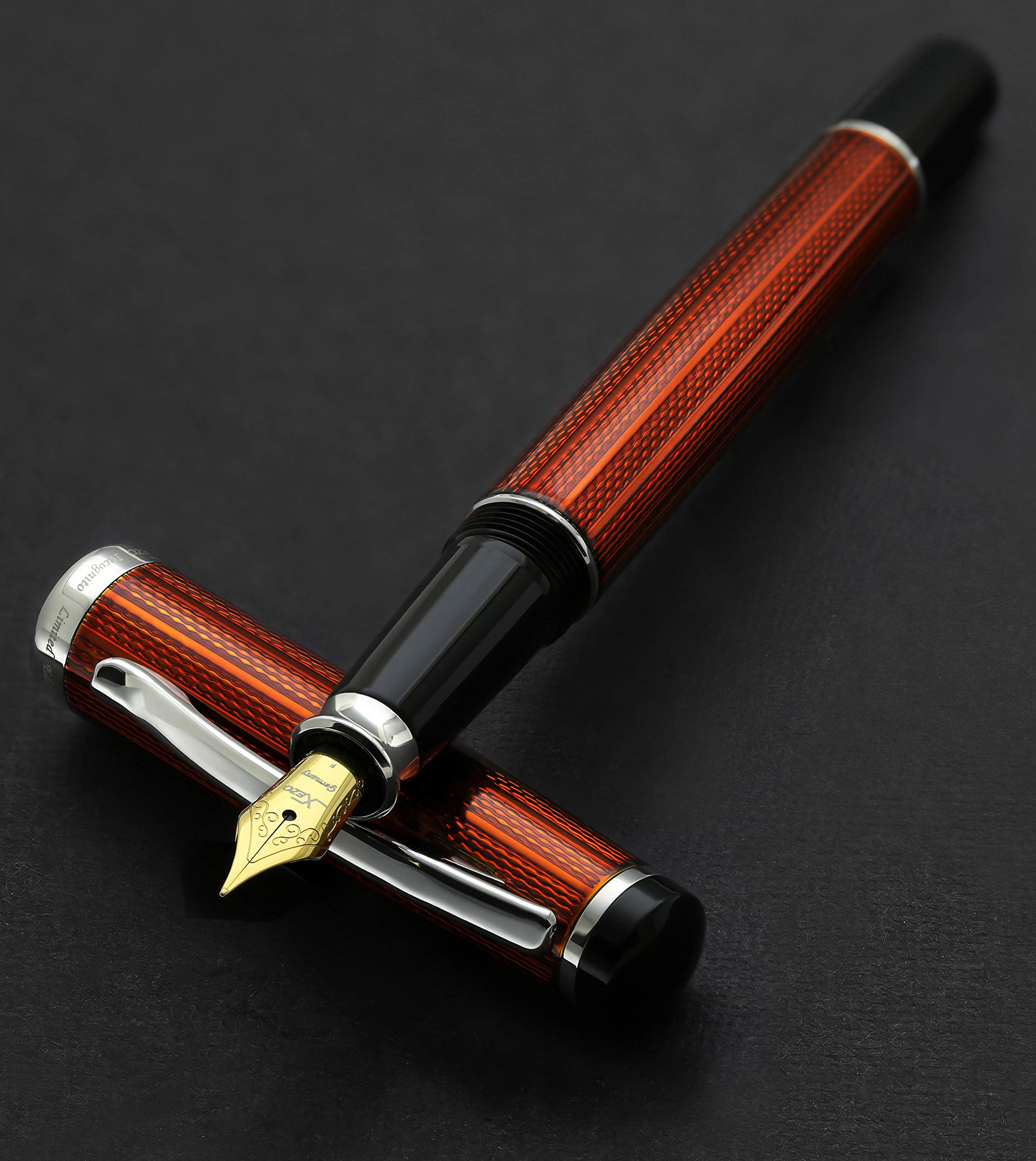 Xezo Incognito Diamond Cut Serial Fine Fountain Sunstone Orange Lacquer Platinum Plated Pen,
Xezo Incognito Diamond Cut Serial Fine Fountain Sunstone Orange Lacquer Platinum Plated Pen,