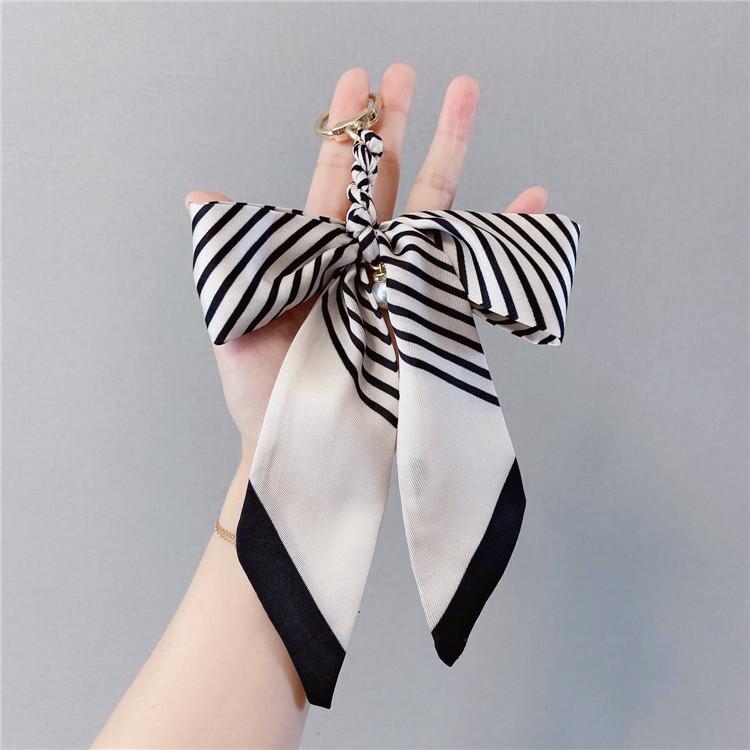 Knot Butterfly Fashionable Key Ring With Pearl Ribbon Design Ideal For Car Keys StyleB
Knot Butterfly Fashionable Key Ring With Pearl Ribbon Design Ideal For Car Keys StyleB