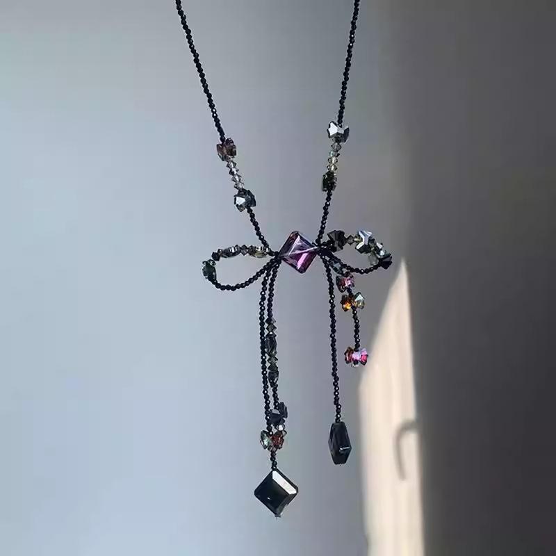 Dark glass bow beaded fringed necklace temperament high-end collarbone chain niche versatile fashion jewelry
Dark glass bow beaded fringed necklace temperament high-end collarbone chain niche versatile fashion jewelry