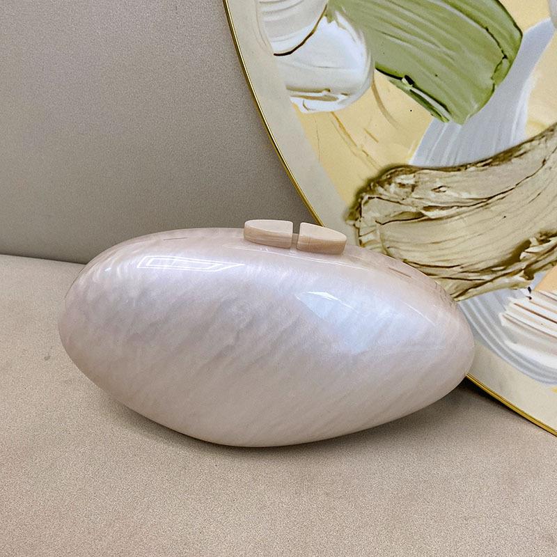 Stylish high-quality textured acrylic bag, oval shell flowing color dinner bag, goose egg clutch bag
Stylish high-quality textured acrylic bag, oval shell flowing color dinner bag, goose egg clutch bag