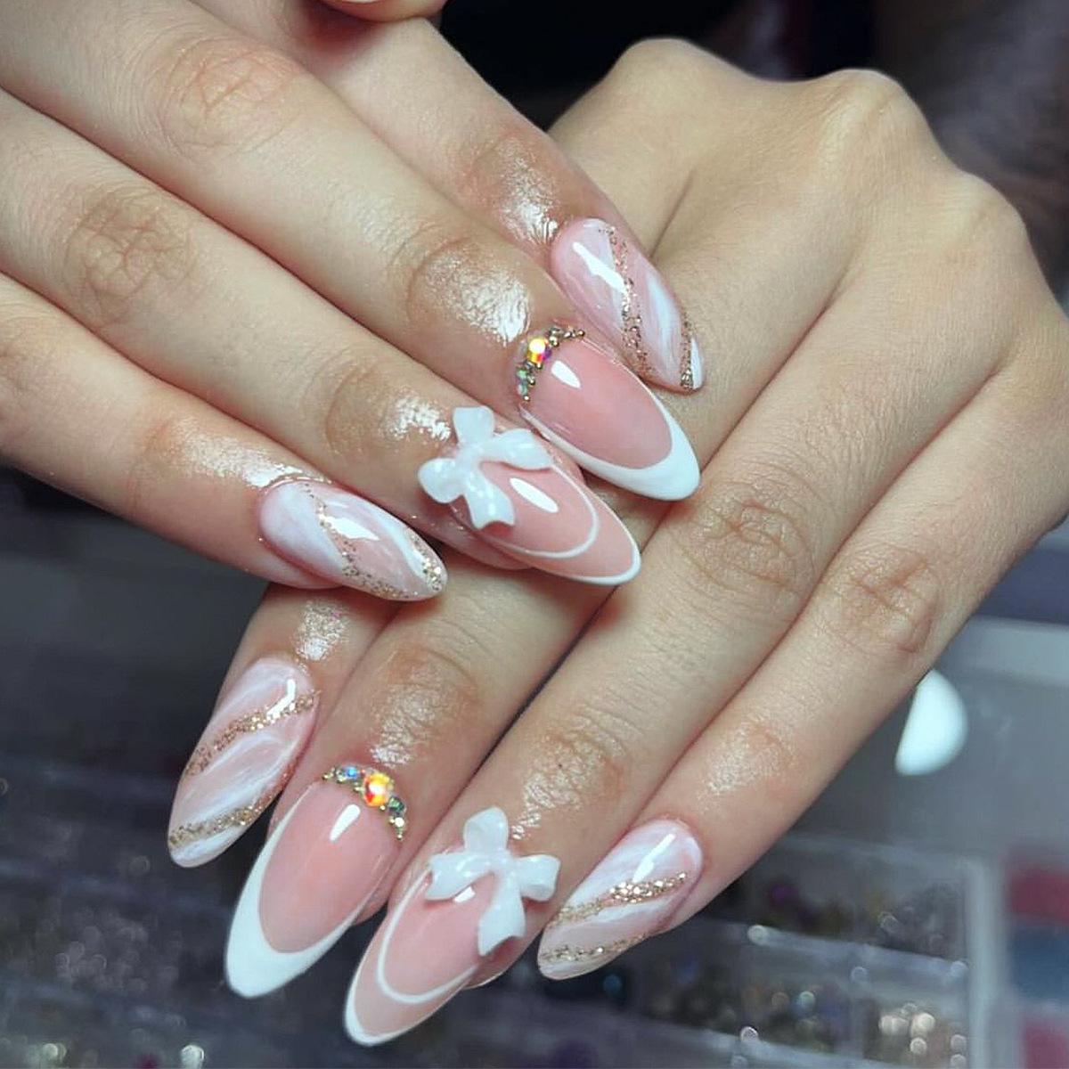 Almond Wearable Nails with White French Tips, Ice Transparent Bow, and Detachable Rhinestone Accents
Almond Wearable Nails with White French Tips, Ice Transparent Bow, and Detachable Rhinestone Accents