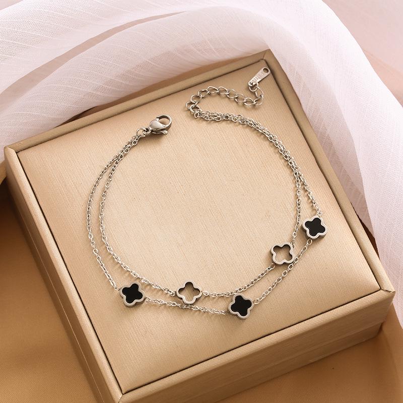 Двухслойный браслет с полым клевером: 18-каратная титановая сталь, уникальный дизайн для женщин
Двухслойный браслет с полым клевером: 18-каратная титановая сталь, уникальный дизайн для женщин