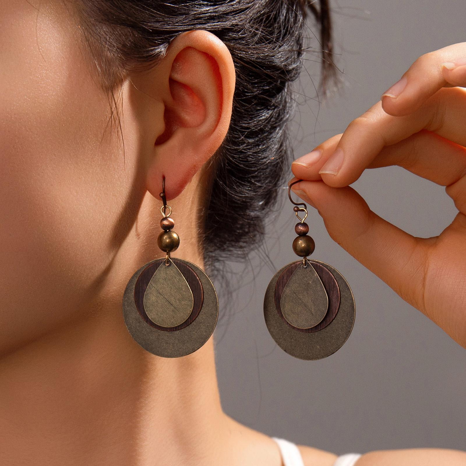 Retro fashion antique bronze multi-layer round bead pendant, environmentally friendly alloy women s earrings
Retro fashion antique bronze multi-layer round bead pendant, environmentally friendly alloy women s earrings