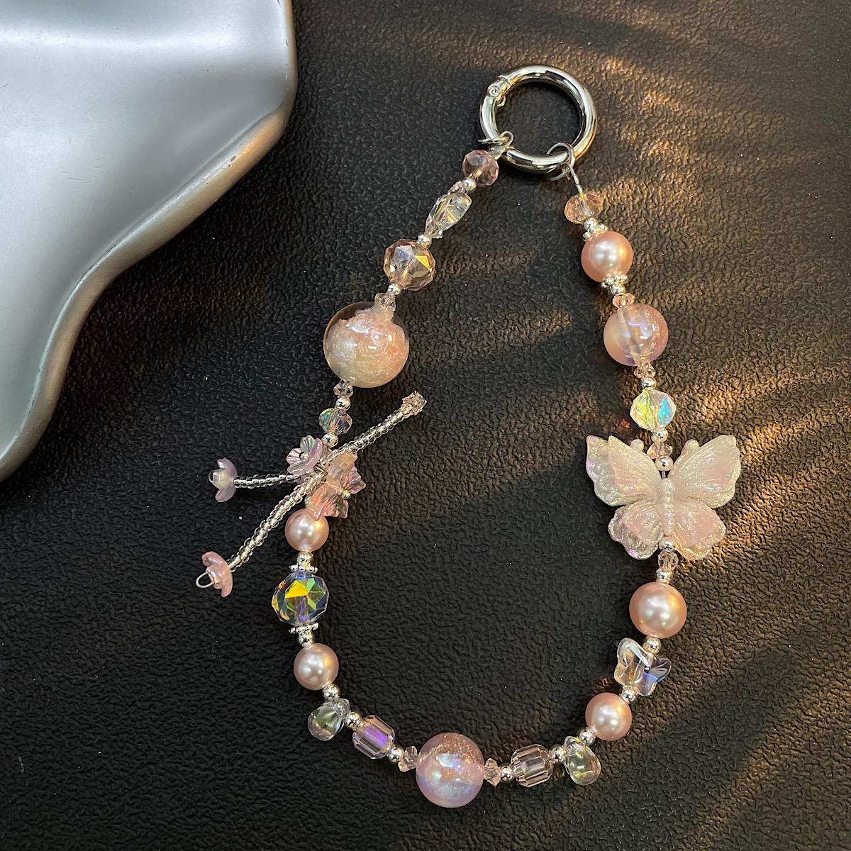 New Sparkling Bead Phone Strap Butterfly Pearl Chain Fashion Beaded Pendant Portable Phone Lanyard
New Sparkling Bead Phone Strap Butterfly Pearl Chain Fashion Beaded Pendant Portable Phone Lanyard