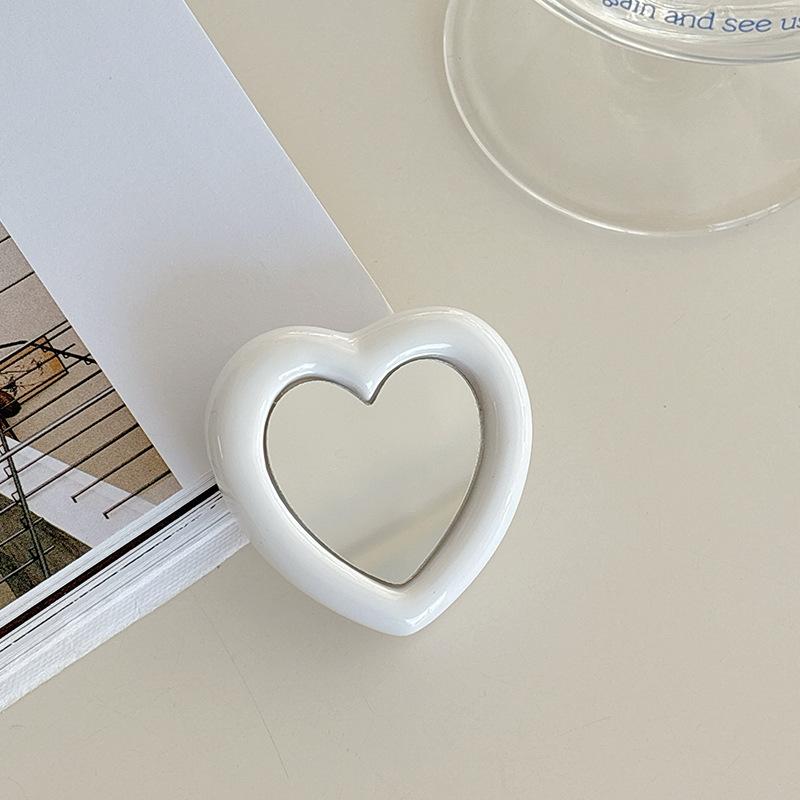 Mobile Phone Airbag Holder, Love Mirror Back Sticker, Retractable And Portable Portable Desktop Watching Drama Stand, Niche Creativity
Mobile Phone Airbag Holder, Love Mirror Back Sticker, Retractable And Portable Portable Desktop Watching Drama Stand, Niche Creativity
