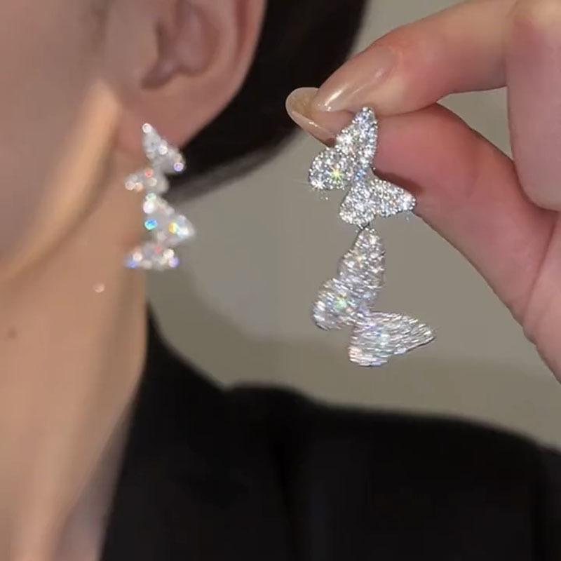 Butterfly tassel earrings exquisite fashion stud earrings light luxury high-end new unique design earrings women
Butterfly tassel earrings exquisite fashion stud earrings light luxury high-end new unique design earrings women