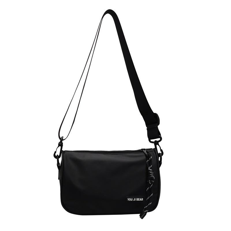 Popular simple tooling style leisure commuter bag men and women with the same light and versatile sports travel messenger bag
Popular simple tooling style leisure commuter bag men and women with the same light and versatile sports travel messenger bag