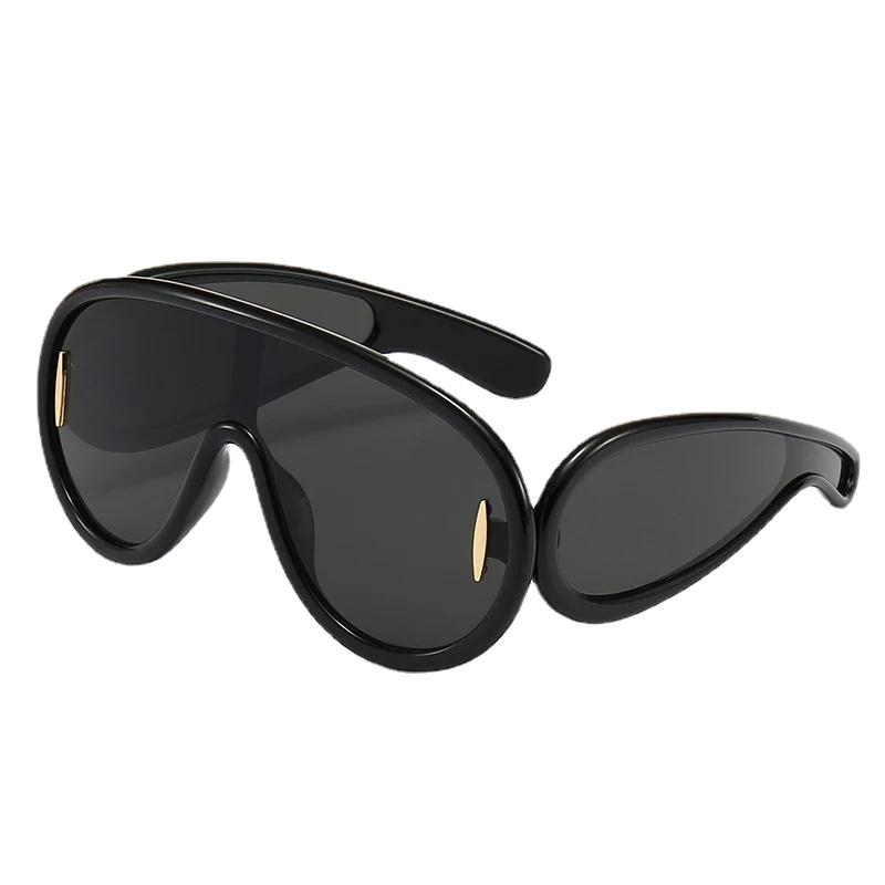 Oversized Y2K Punk One-Piece Sunglasses Women Sports Wave Mask Sun Glasses for Lady Luxury Brand Steampunk Eyewear Goggle As shown in Figure
Oversized Y2K Punk One-Piece Sunglasses Women Sports Wave Mask Sun Glasses for Lady Luxury Brand Steampunk Eyewear Goggle As shown in Figure