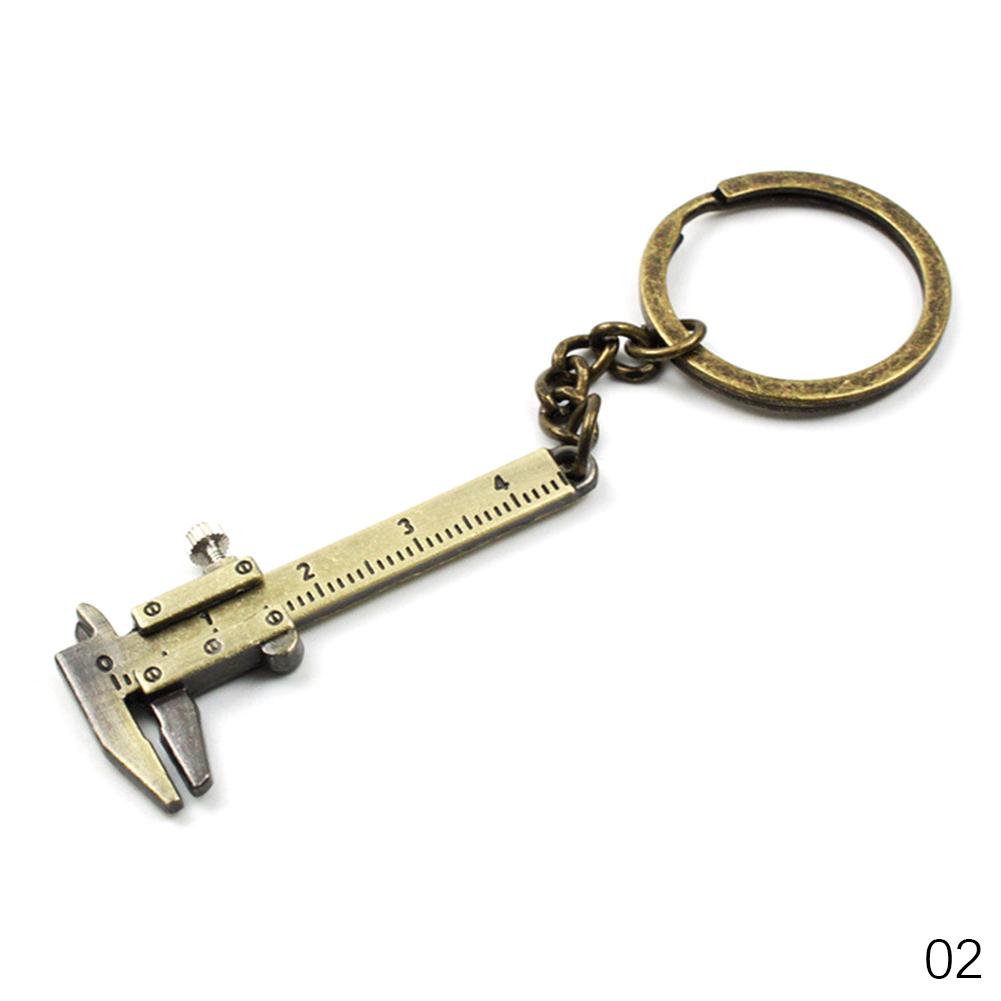 Small 3D Movable Precision Measure Tool Accessories Slider Ruler Alloy Mini Vernier Caliper Pocket Key Chain Keyring Ornaments
Small 3D Movable Precision Measure Tool Accessories Slider Ruler Alloy Mini Vernier Caliper Pocket Key Chain Keyring Ornaments
