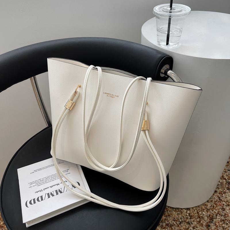 Western Style Bag Female 2026 Summer New Fashion Simple Large Capacity Portable Shoulder Bag Commuting Tote Bag M
Western Style Bag Female 2026 Summer New Fashion Simple Large Capacity Portable Shoulder Bag Commuting Tote Bag M