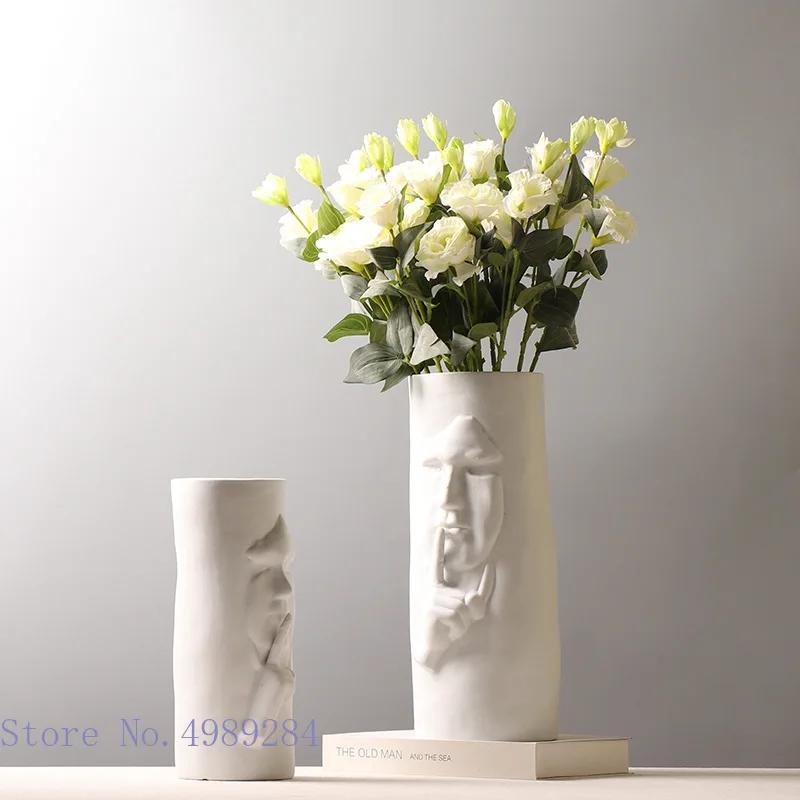 Ceramic Vase Abstract Face Silence Mask Character Relief Flower Vase Straight Flower Arrangement Home Decoration Ornaments
Ceramic Vase Abstract Face Silence Mask Character Relief Flower Vase Straight Flower Arrangement Home Decoration Ornaments