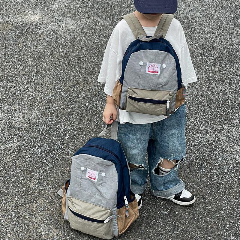 Kindergarten school bag leisure children boys and girls travel backpack Harajuku simple contrasting color trend backpack
Kindergarten school bag leisure children boys and girls travel backpack Harajuku simple contrasting color trend backpack