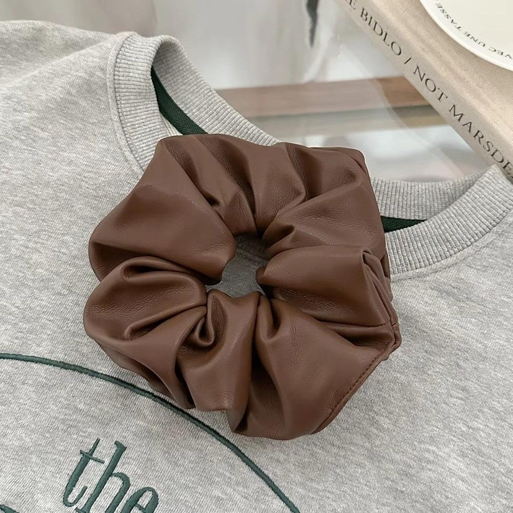 Leather Hair Rings Elastic Intestine-shaped Hair Tie Korean Hair Band Hair Accessories кавовий
Leather Hair Rings Elastic Intestine-shaped Hair Tie Korean Hair Band Hair Accessories кавовий