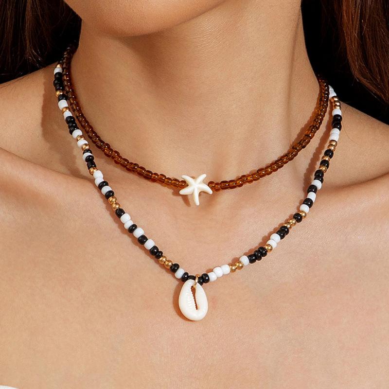 New Bohemian double-layer starfish shell rice bead pendant necklace beach vacation women s collarbone chain necklace
New Bohemian double-layer starfish shell rice bead pendant necklace beach vacation women s collarbone chain necklace