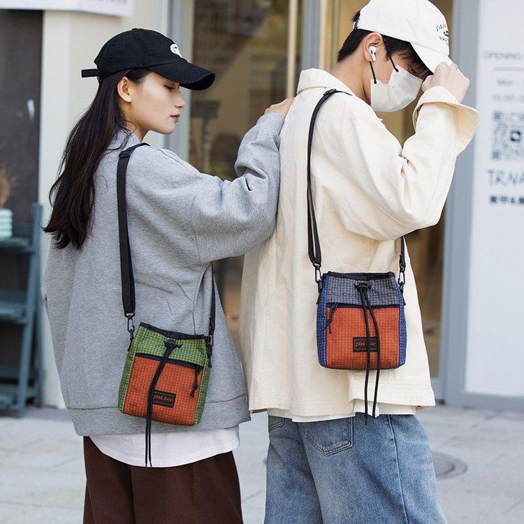 Nylon bag color matching drawstring bag 2025 new neutral locomotive bag outdoor sports bag shoulder messenger bag bag
Nylon bag color matching drawstring bag 2025 new neutral locomotive bag outdoor sports bag shoulder messenger bag bag