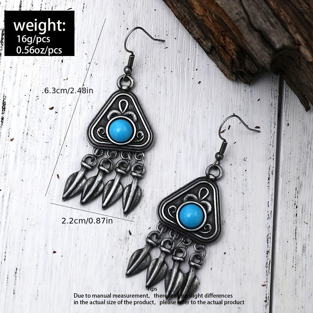Винтажные висячие серьги с кисточками из перьев, резные треугольные формы, синие синтетические драгоценные камни, инкрустированные висячими серьгами, ретро, этнический стиль, женский подарок
Винтажные висячие серьги с кисточками из перьев, резные треугольные формы, синие синтетические драгоценные камни, инкрустированные висячими серьгами, ретро, этнический стиль, женский подарок