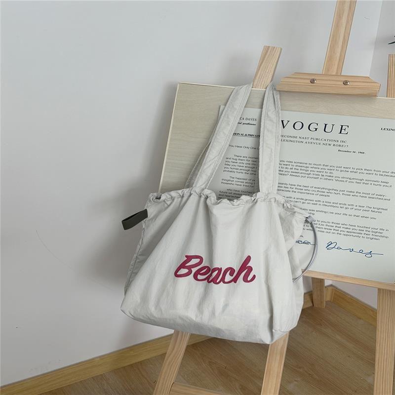Summer Canvas Bag Red Lazy Fashion K-style New Arrival Letter Shoulder Bag Bag Girls Large Capacity Underarm Bag beach Nylon Bag-light gray
Summer Canvas Bag Red Lazy Fashion K-style New Arrival Letter Shoulder Bag Bag Girls Large Capacity Underarm Bag beach Nylon Bag-light gray