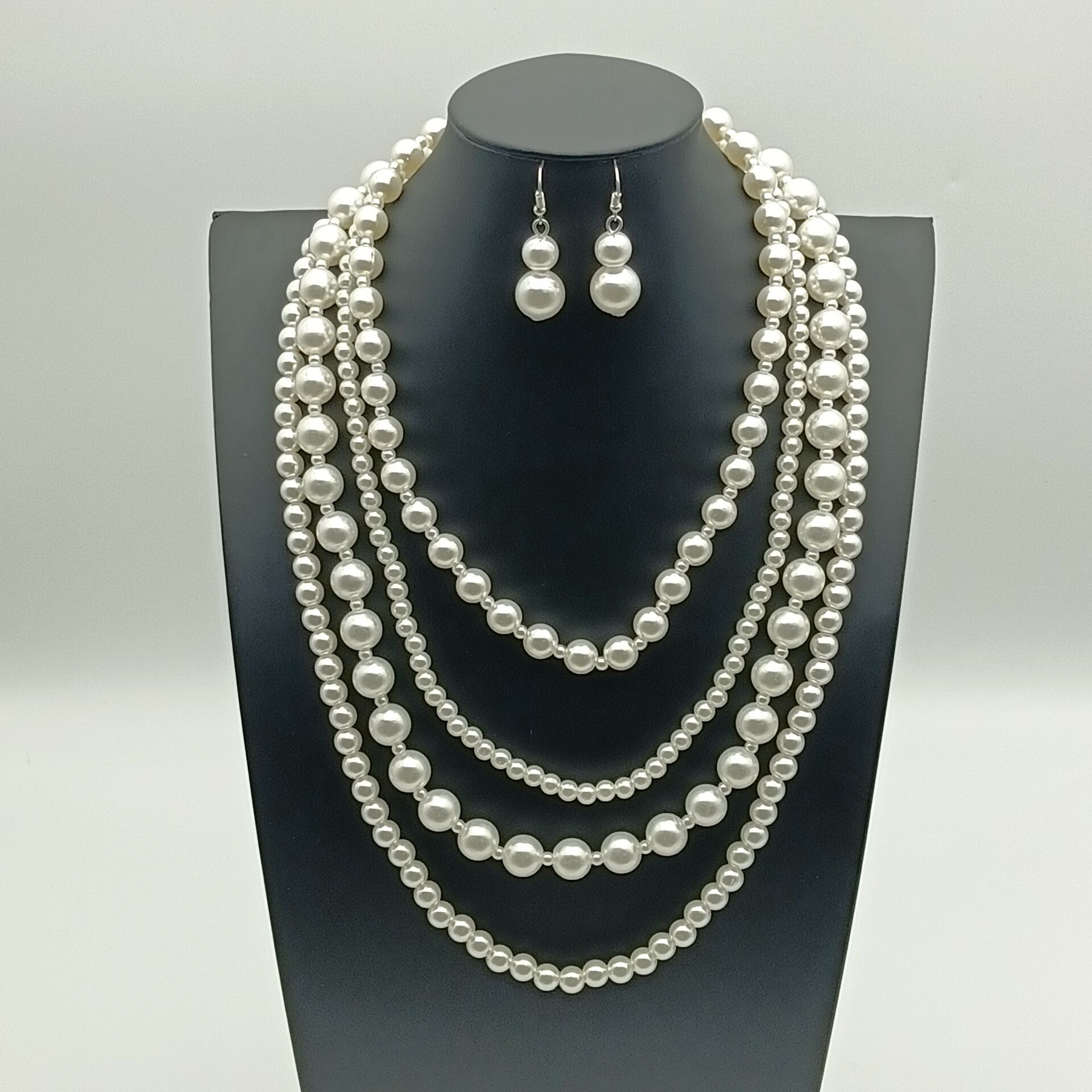 Europe and the United States hot sale fashion simple ball party multi-layer pearl necklace earrings set
Europe and the United States hot sale fashion simple ball party multi-layer pearl necklace earrings set