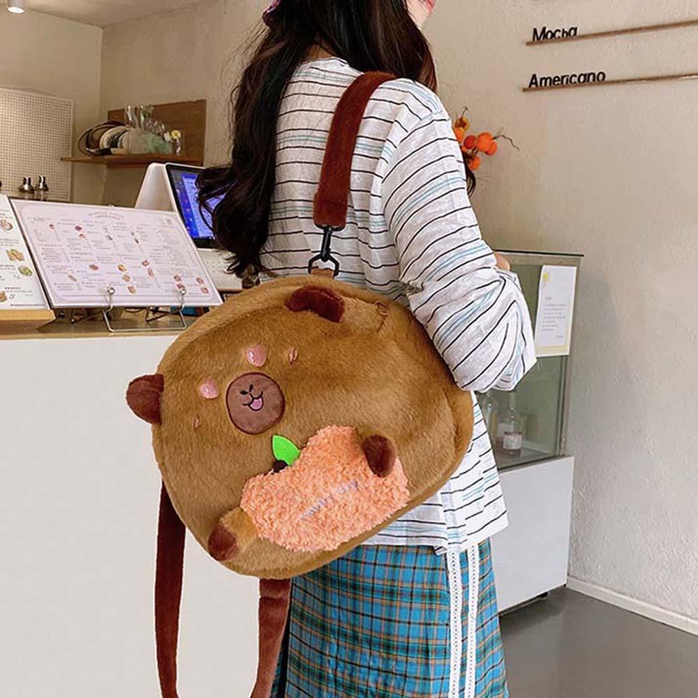 Soft Capybara Shoulder Bag Cute Cartoon Doll Backpack Creative Plush Capybara Daypack Girls Style 2
Soft Capybara Shoulder Bag Cute Cartoon Doll Backpack Creative Plush Capybara Daypack Girls Style 2