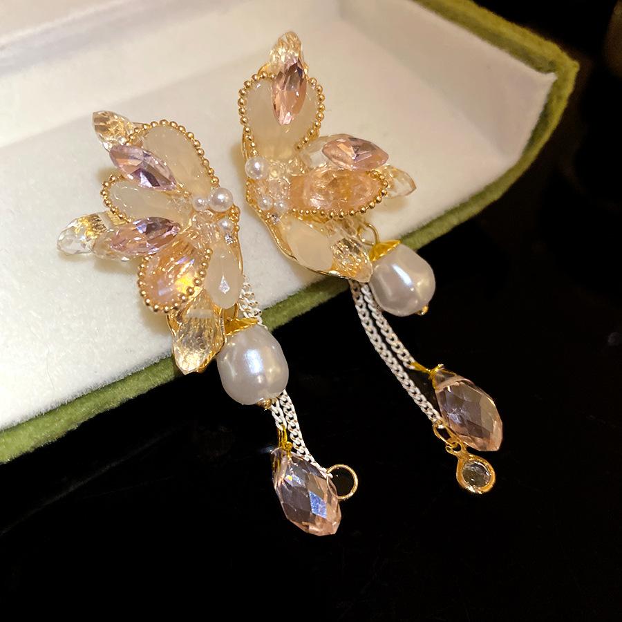 Silver Needle Diamond Butterfly Water Drop Pearl Tassel Earrings Niche Design Super Immortal Light Luxury Premium Temperament Earrings Women
Silver Needle Diamond Butterfly Water Drop Pearl Tassel Earrings Niche Design Super Immortal Light Luxury Premium Temperament Earrings Women