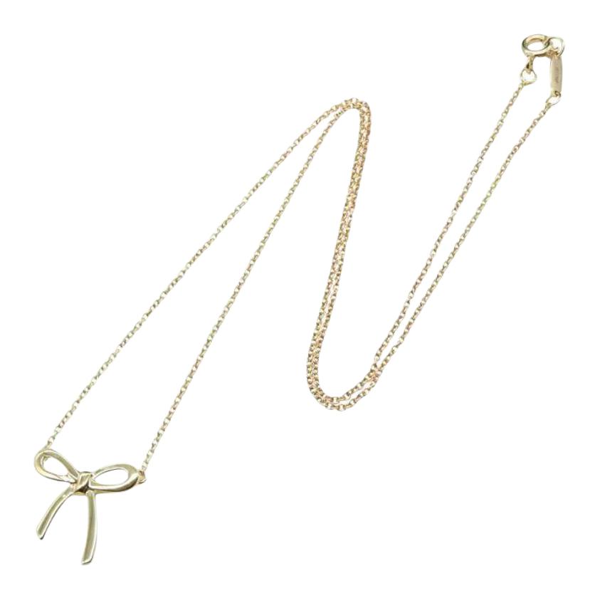 Tiffany & Co. Elegant Satin Ribbon 18K Gold Necklace Women necklace 1048852 Box+Shopping Bag
Tiffany & Co. Elegant Satin Ribbon 18K Gold Necklace Women necklace 1048852 Box+Shopping Bag