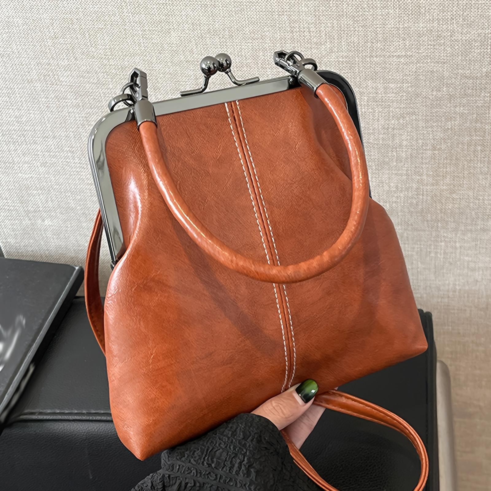 Elegant Crossbody Bag For Women Faux Leather Shoulder Purse Kiss Lock Closure Lightweight City Theme Handbag Polyester Lined With Adjustable Strap коричневий
Elegant Crossbody Bag For Women Faux Leather Shoulder Purse Kiss Lock Closure Lightweight City Theme Handbag Polyester Lined With Adjustable Strap коричневий