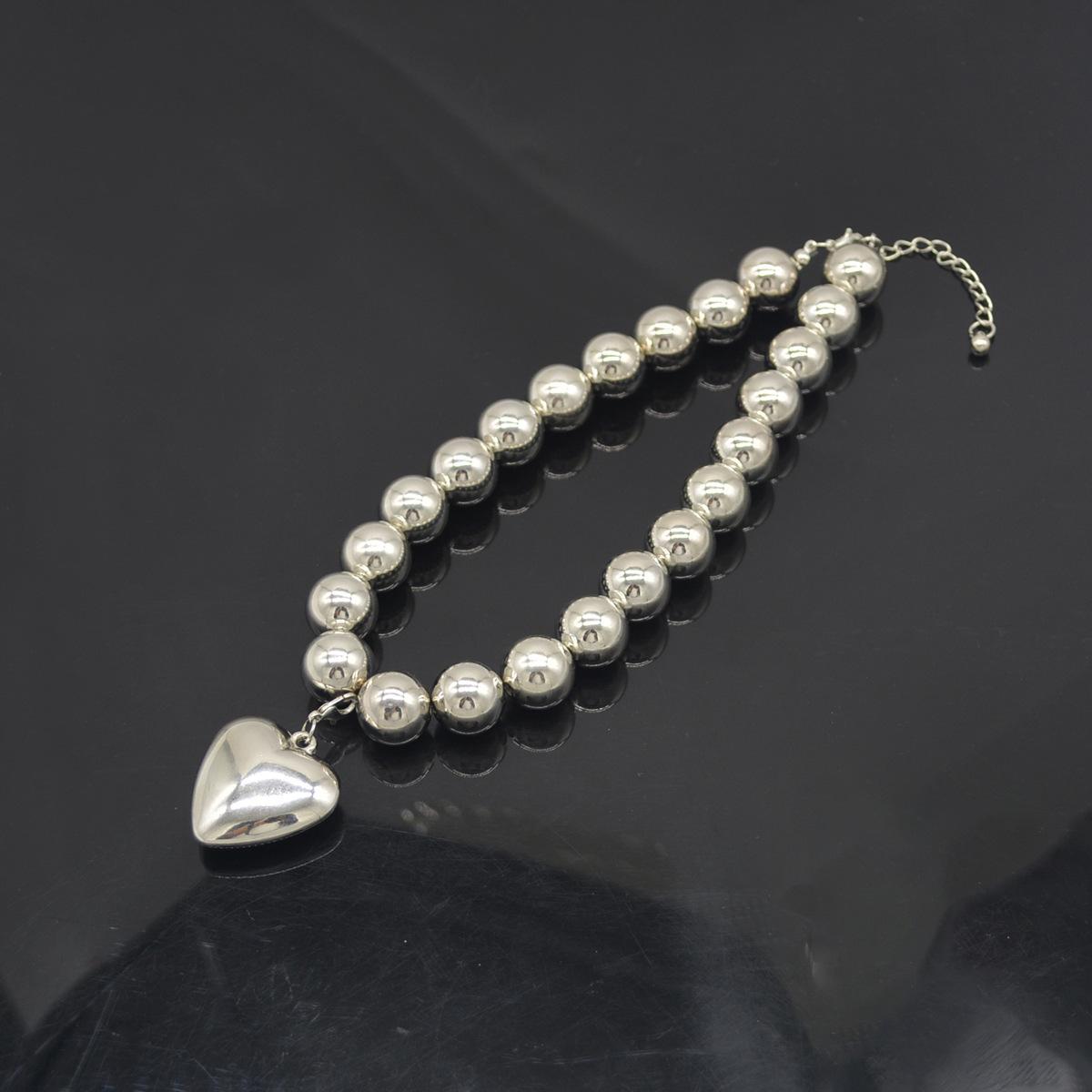 Exaggerated removable peach heart pendant CCB bead necklace metal punk neck chain fashion temperament collarbone chain срібний
Exaggerated removable peach heart pendant CCB bead necklace metal punk neck chain fashion temperament collarbone chain срібний
