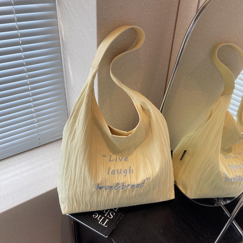 Women s Shoulder Bag High - end Sense Unique Ins Lazy Style Tote Bag for Commuting Versatile Cream Color Handbag
Women s Shoulder Bag High - end Sense Unique Ins Lazy Style Tote Bag for Commuting Versatile Cream Color Handbag