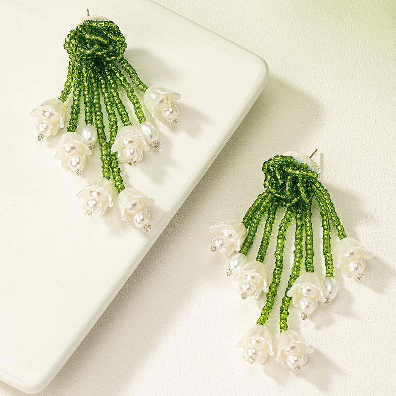 Summer sweet green beaded flower fringed lily of the valley earrings fashion temperament long design women s earrings зелений
Summer sweet green beaded flower fringed lily of the valley earrings fashion temperament long design women s earrings зелений