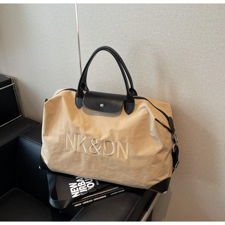 Canvas bag women s large-capacity new spring and summer messenger business travel luggage leisure short-distance travel bag
Canvas bag women s large-capacity new spring and summer messenger business travel luggage leisure short-distance travel bag