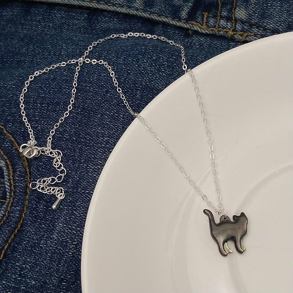 Минималистичное ожерелье-чокер с белым перламутровым кулоном в виде котенка в стиле INS для женщин
Минималистичное ожерелье-чокер с белым перламутровым кулоном в виде котенка в стиле INS для женщин