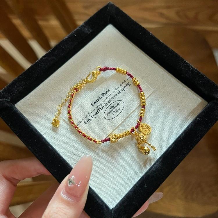 New Red Braided Rope Rotary Cylinder Pendant Hand Rope New Chinese Style National Tide Style Bracelet Retro National Style Jewelry Recommendation
New Red Braided Rope Rotary Cylinder Pendant Hand Rope New Chinese Style National Tide Style Bracelet Retro National Style Jewelry Recommendation