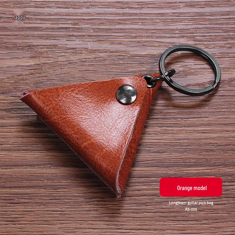 Leather Guitar Pick Holder Keychain for Acoustic, Electric & Ukulele Picks помаранчевий
Leather Guitar Pick Holder Keychain for Acoustic, Electric & Ukulele Picks помаранчевий