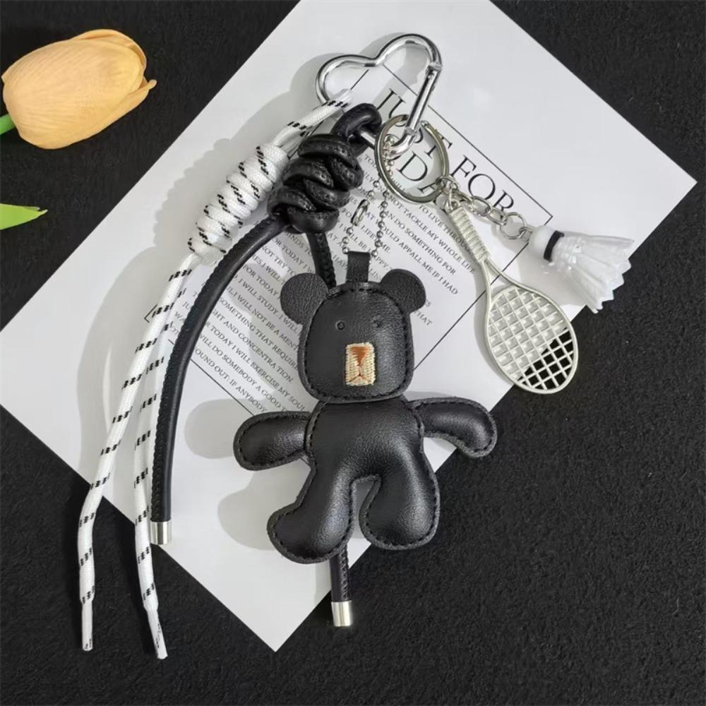 Cartoon Bear Racket Keychain Woven Rope Little Bear Bag Hanging Leather Bag Pendant Friendship чёрный
Cartoon Bear Racket Keychain Woven Rope Little Bear Bag Hanging Leather Bag Pendant Friendship чёрный