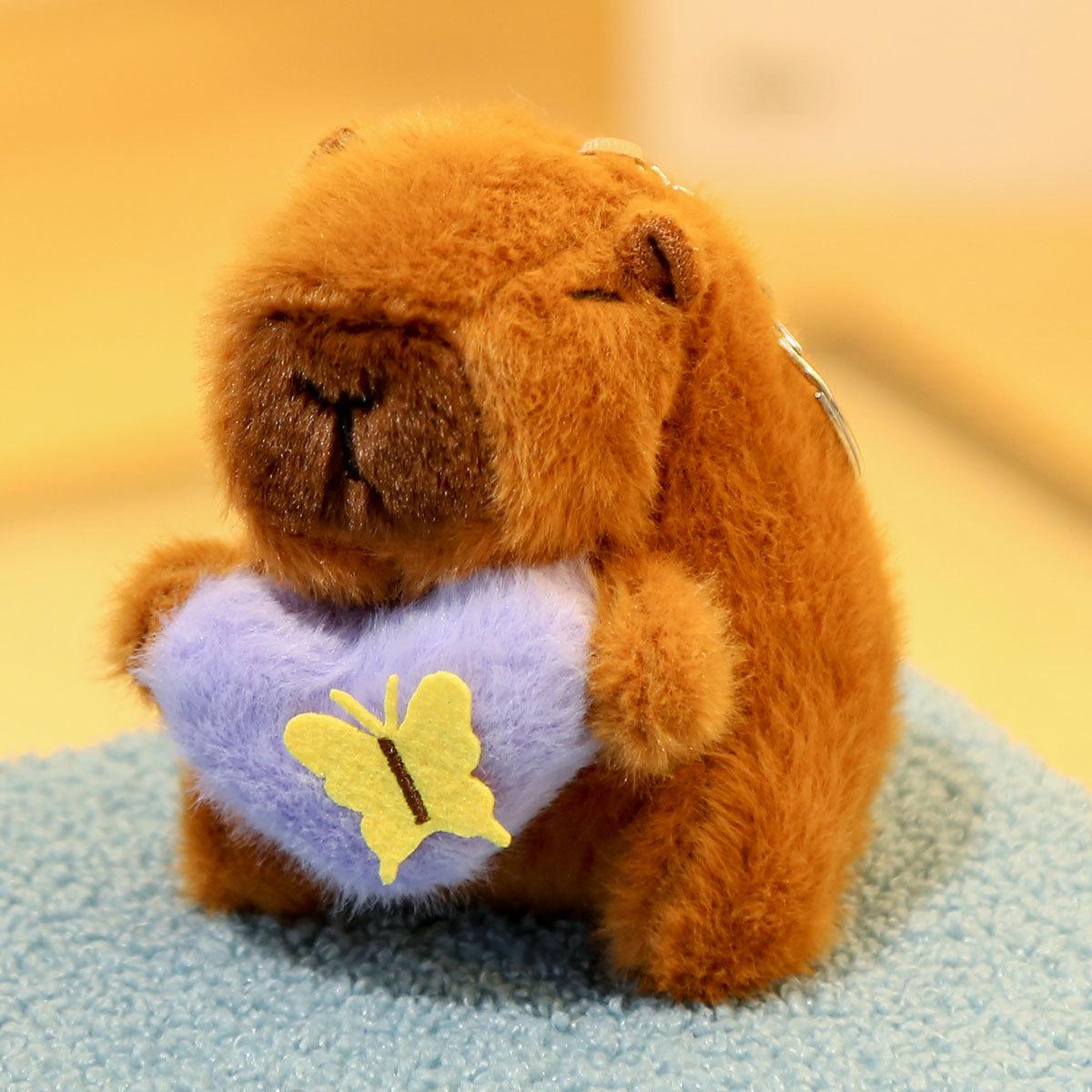 Capibara doll keychain, bag pendant, capybara doll, butterfly heart pendant, schoolbag pendant, keychain. Approx. 12cm/50g
Capibara doll keychain, bag pendant, capybara doll, butterfly heart pendant, schoolbag pendant, keychain. Approx. 12cm/50g