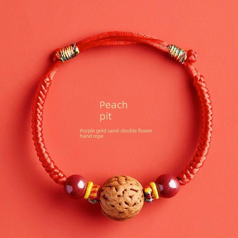 Браслет из красной веревки с косточкой персика с горы Путо для младенцев и детей, детская плетеная веревка с персиковой корзиной, амулет из персикового дерева с символом мира и драконом на год Дракона 14cm Old peach stone (purple gold sand) adjustable
Браслет из красной веревки с косточкой персика с горы Путо для младенцев и детей, детская плетеная веревка с персиковой корзиной, амулет из персикового дерева с символом мира и драконом на год Дракона 14cm Old peach stone (purple gold sand) adjustable
