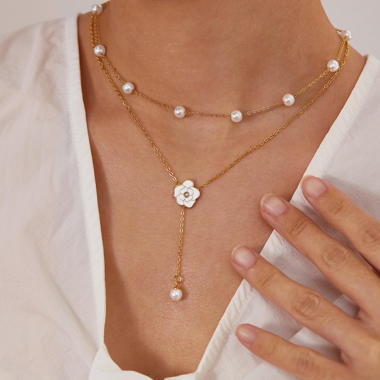 Camellia Pearl Tassel Necklace: Elegant Summer Clavicle Chain with Titanium Steel Pendant for Women
Camellia Pearl Tassel Necklace: Elegant Summer Clavicle Chain with Titanium Steel Pendant for Women