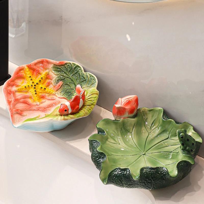 1pc Ceramic Soap Dish Ornament Drain Soap Box Fish Frog Lotus Bathroom Accessories Home Decorations Kitchen Soap Holder
1pc Ceramic Soap Dish Ornament Drain Soap Box Fish Frog Lotus Bathroom Accessories Home Decorations Kitchen Soap Holder